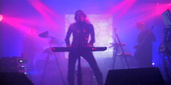 the rock band Moodorgan performs in Los Angeles in November 2009. LED lighting, scanners, lasers, FX and video projections are all sequencer/MIDI/DMX-controlled and sync'ed.
